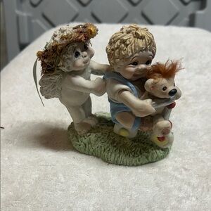 A Vintage 1995 Dreamsicles "Easy Rider" figurine by Kristin Boy.